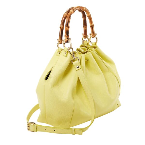 designer leather tote with adjustable strap and bamboo handles yellow